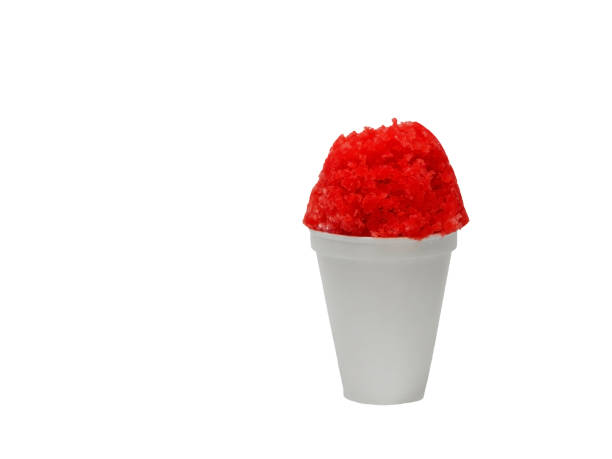 Cherry red or Tiger's Blood shaved ice, shave ice or snow cone in a white cup. stock photo