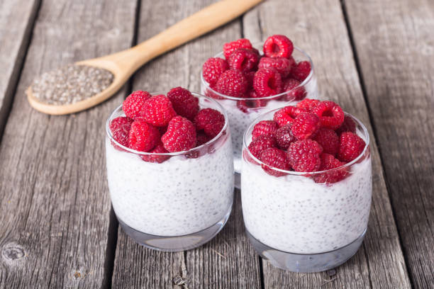 Chia pudding in glass with raspberry stock photo