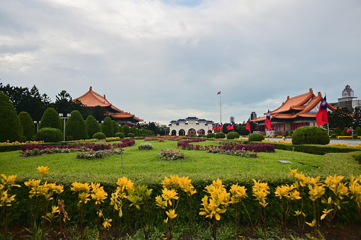 Chiang Kai-Shek Memorial Hall, Taipei, Taiwan - October 13, 2021: View over the impressive Liberty Square with the National Theatre and the National Concert Hall to the main gate at a cloudy and rainy