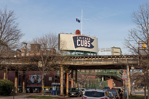 Chicago - Circa April 2022: Chicago Cubs center field marquee on the northwest corner of Wrigley field. Wrigley Field has been home to the Cubs since 1916.