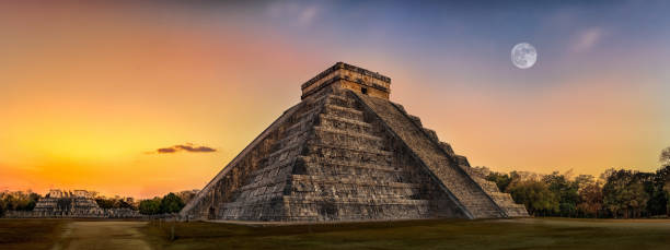 chichen itza during different sunsets in Mexico chichen itza with various sunsets chichen itza stock pictures, royalty-free photos & images