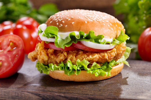 chicken burger with vegetables stock photo