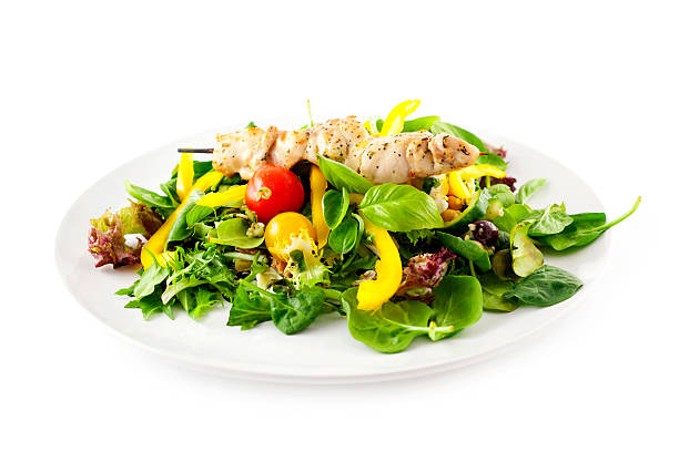 Chicken Kebab with Salad A plate of mixed side salad with chicken kebab. chicken salad stock pictures, royalty-free photos & images