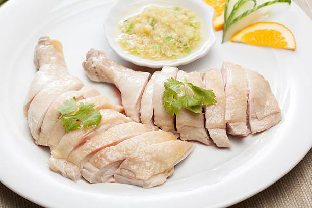 chicken legs famous chinese food - poached chicken with ginger sauce poached food stock pictures, royalty-free photos & images
