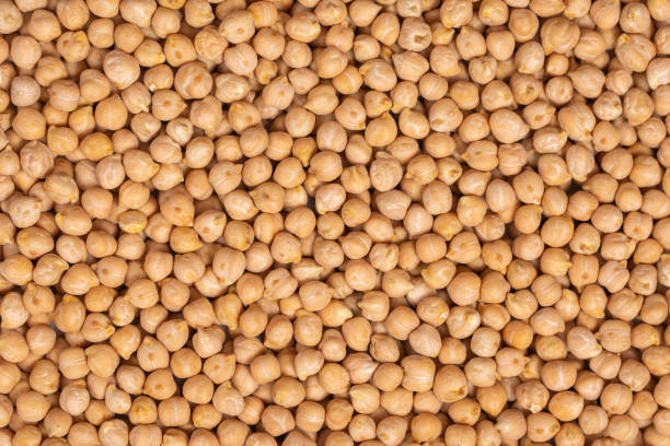 Chickpeas. Legumes background. chick pea stock pictures, royalty-free photos & images