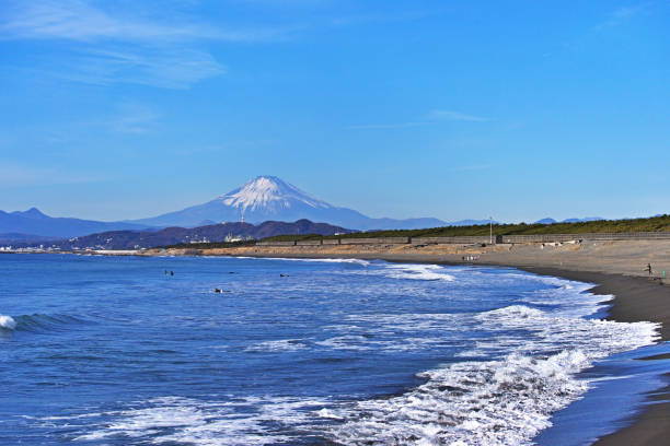 Chigasaki Beach and Mount Fuji Chigasaki Beach and Mount Fuji chigasaki stock pictures, royalty-free photos & images