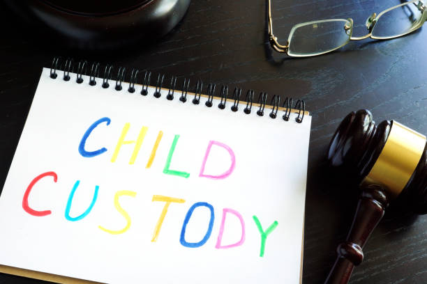 Child custody written in a note and gavel. Separation concept. Child custody written in a note and gavel. Separation concept. child custody attorney stock pictures, royalty-free photos & images