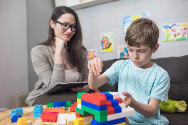 Child psychologist at work School counselor and pupil school counselor stock pictures, royalty-free photos & images