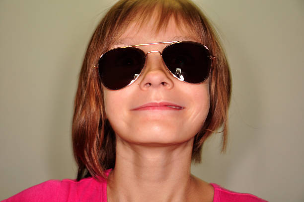 child wearing glasses stock photo