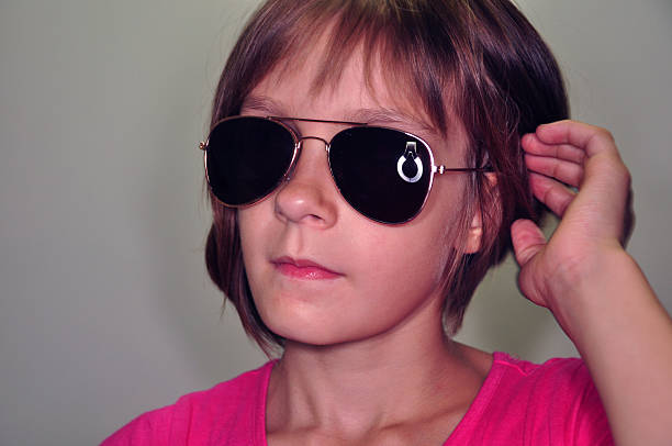 child wearing sunglasses stock photo