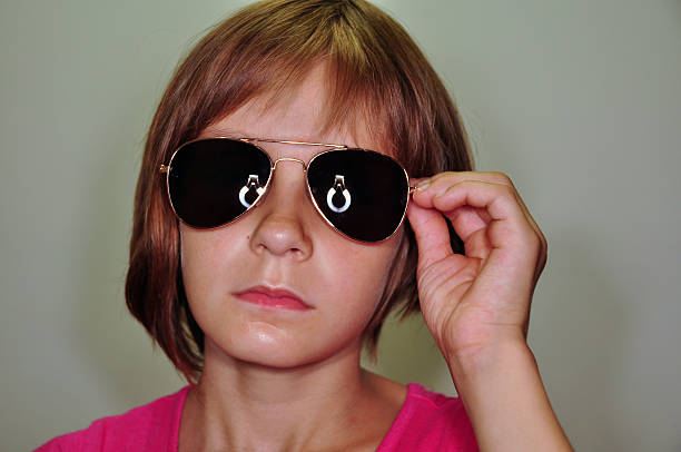 child wearing sunglasses stock photo