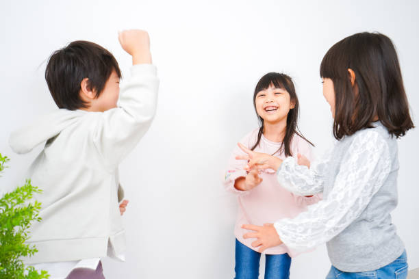 Children having fun playing in their room Children having fun playing in their room child korea little girls korean ethnicity stock pictures, royalty-free photos & images