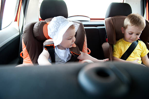 Children travelling in car stock photo