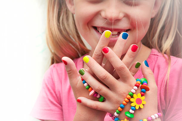 Children's multicolored manicure. stock photo