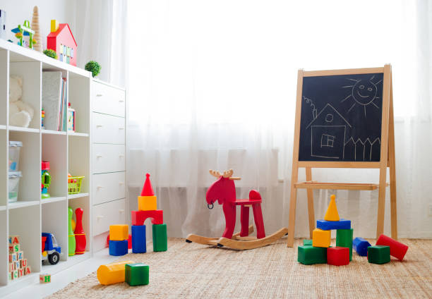 Children's playroom with plastic colorful educational blocks toys. stock photo
