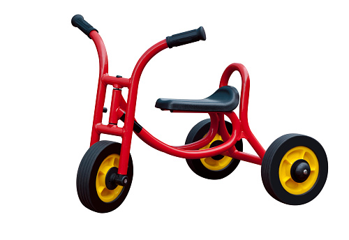Child's red modern tricycle isolated on white background with clipping path