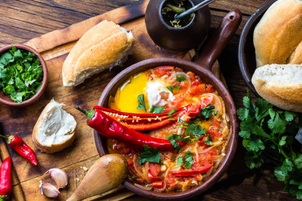 Chilean food. "Picante Caliente" or "spicy hot" with onion, tomatos, chilli aand eggs  spicy food stock pictures, royalty-free photos & images