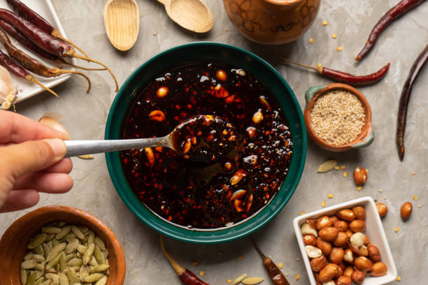 Chili oil sauce with sesame and peanuts called macha. Mexican food stock photo
