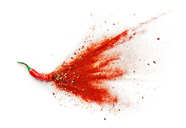 chilli, red pepper flakes and chilli powder - kruid stockfoto's en -beelden