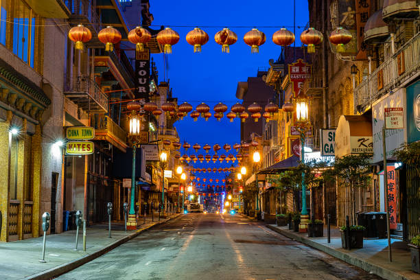 Chinatown at Blue Hour An empty Chinatown in San Francisco at blue hour during the COVID-19 pandemic. chinatown stock pictures, royalty-free photos & images