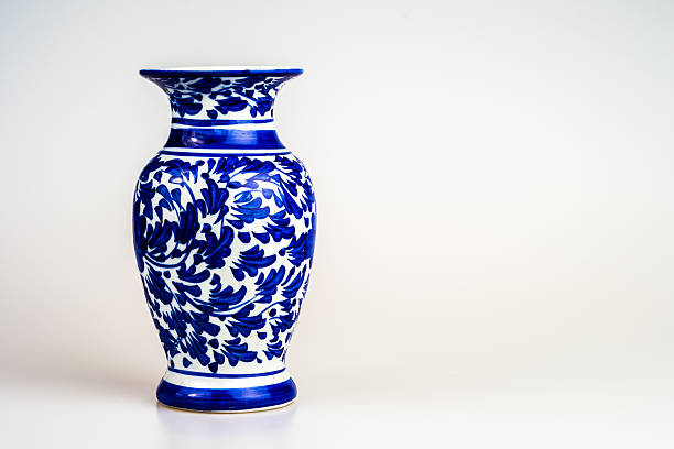 chinese antique vase chinese antique vase on the plain back ground porcelain stock pictures, royalty-free photos & images