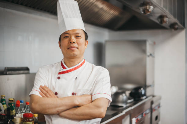 chinesischer chefkoch - asiatischer koch stock-fotos und bilder