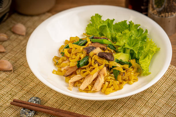 Chinese noodle with chicken and shiitake mushroom stock photo