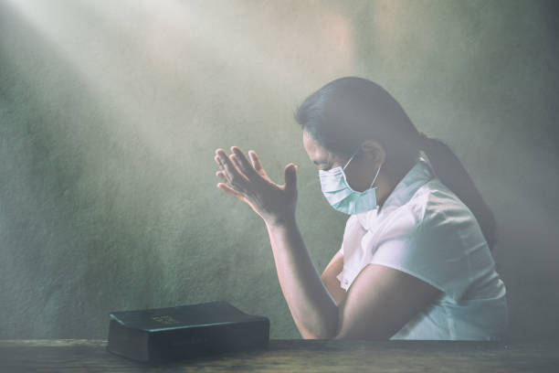 Chinese woman wearing mask for protect pm2.5 and Covid-19. stock photo