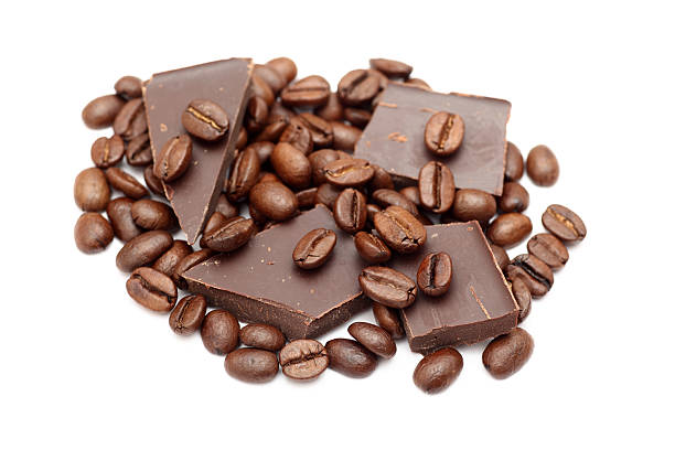 chocolate bars and coffee beans on white background - caffè mocha stockfoto's en -beelden