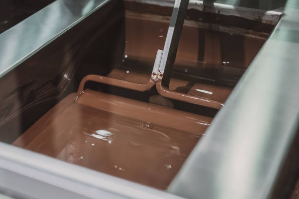 Chocolate being stirred stock photo