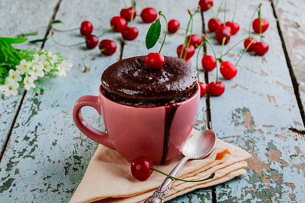 chocolate cake in a mug stock photo