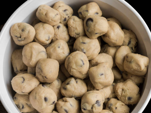 Chocolate Chip Cookie Dough in Bowl Home Baked stock photo