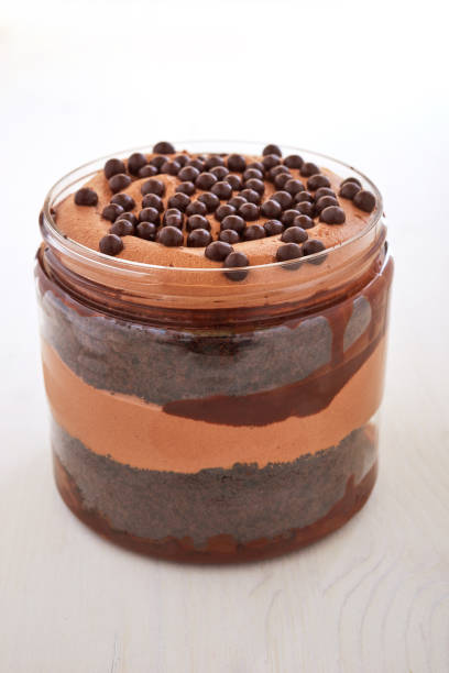 Chocolate cupcake in glass jar stock photo