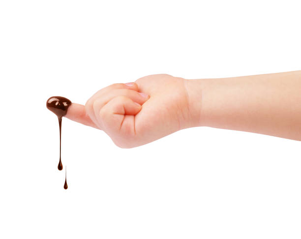 chocolate-drips-from-a-childs-finger-on-a-white-background-picture-id905753156?k=6&m=905753156&s=612x612&w=0&h=NI8sCiPTIoafXNGgMpemyEXEpl_xUmtvPcqg_xm_5n4=