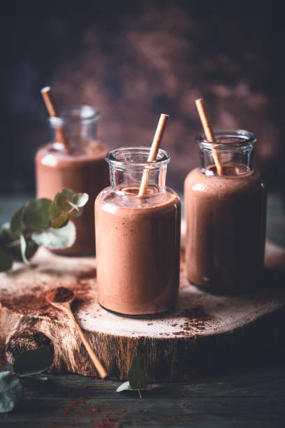 Chocolate Smoothie, Banana and Peanut Butter. Vegan drink stock photo