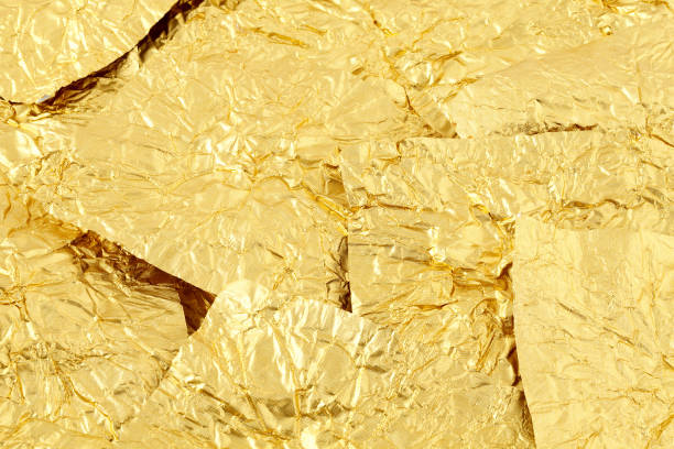 Chocolate wrappers gold stock photo