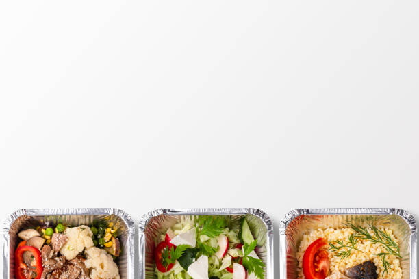 Choose your lunch - concept menu , top view, mockup, copy space Healthy lunch in foil boxes menu concept, top view, isolated, mockup food state stock pictures, royalty-free photos & images