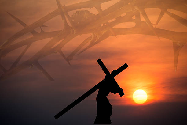 Christ carrying the cross with crown of thorns background  good friday stock pictures, royalty-free photos & images