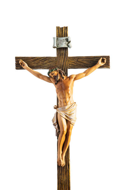Christ on Cross A small statue of Jesus Christ on the Cross isolated on white crucifix stock pictures, royalty-free photos & images