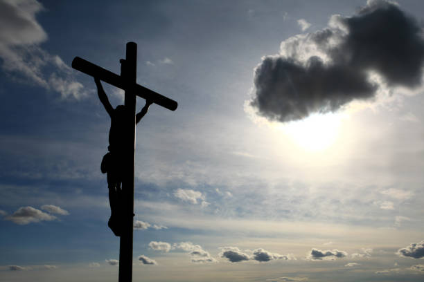 Christ on the Cross Easter Silhouette  good friday stock pictures, royalty-free photos & images