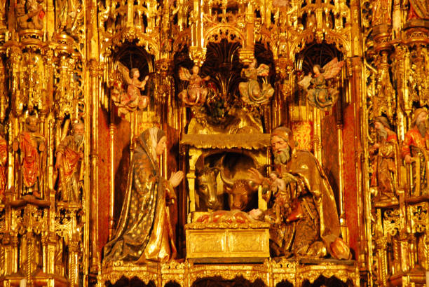 Christianity nativity scene. Inside of the  Cathedral of Saint Mary of the See. Altar pieces with nativity scene. Birth of Jesus. With Mary and Joseph. Ox and donkey. seville cathedral stock pictures, royalty-free photos & images