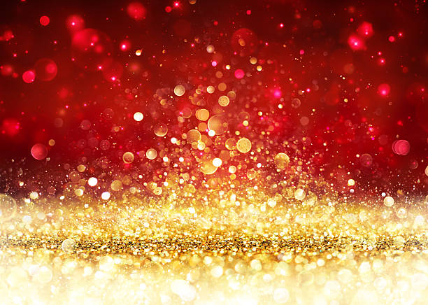 Christmas Background - Golden Glitter On Shiny Red Backdrop For Presentation and Showing Of Christmas paranormal photos stock pictures, royalty-free photos & images