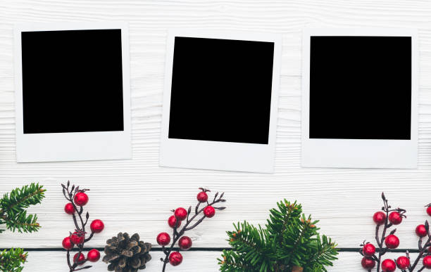 Christmas Blank photo frames Remembrance and nostalgia in Christmas flat lay photos stock pictures, royalty-free photos & images