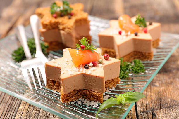 christmas canape with gingerbread and foie gras christmas canape with gingerbread and foie gras foie gras stock pictures, royalty-free photos & images