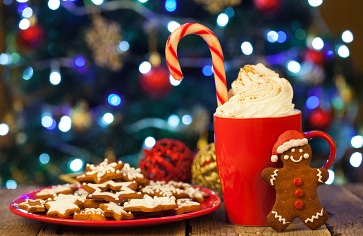 Christmas Cappuccino And Gingerbread Cookies Infront Christmas Tree ...