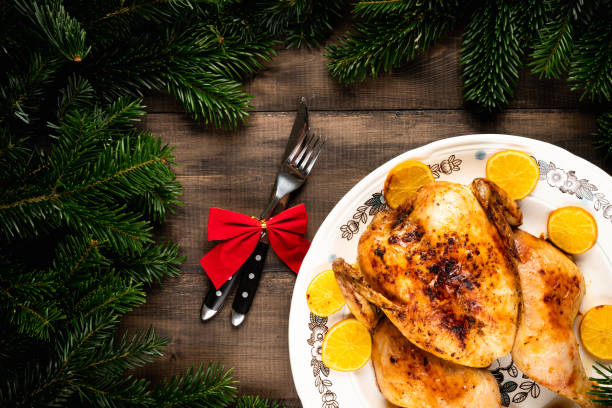 Christmas chicken on the rustic background. Selective focus. Christmas food. stock photo