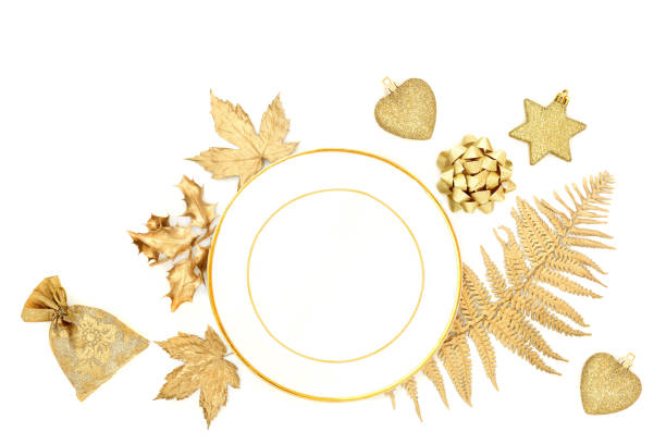 Christmas Decorative White and Gold Table Place Setting stock photo