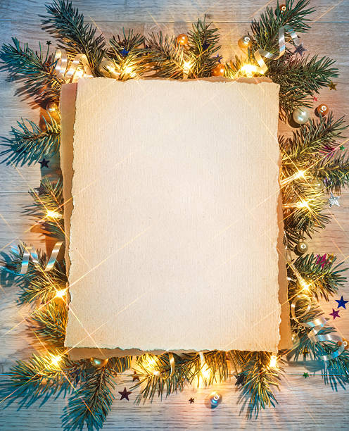 Christmas fir tree with greeting paper. Christmas fir tree with greeting paper. Merry Christmas and Happy New Year!! Top view. christmas photography backdrops stock pictures, royalty-free photos & images