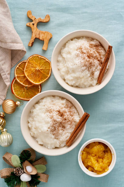 Christmas food. Rice pudding. French milk rice dessert. Two bowl. of healthy Vegan diet breakfast stock photo