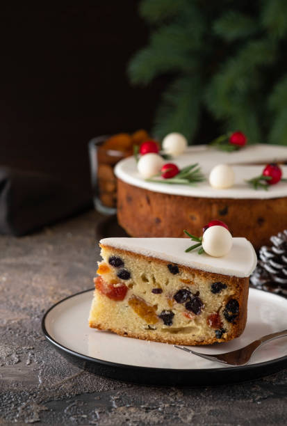 Christmas fruit cake, pudding on white plate. Copy space. stock photo